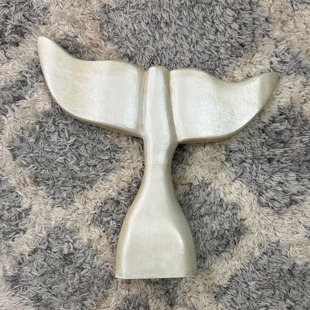 Elegant Cream Whale Tail Sculpture